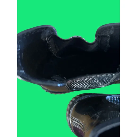 Women's Michael Kors black patent Lulu PVC Chelsea boot with stud accents.